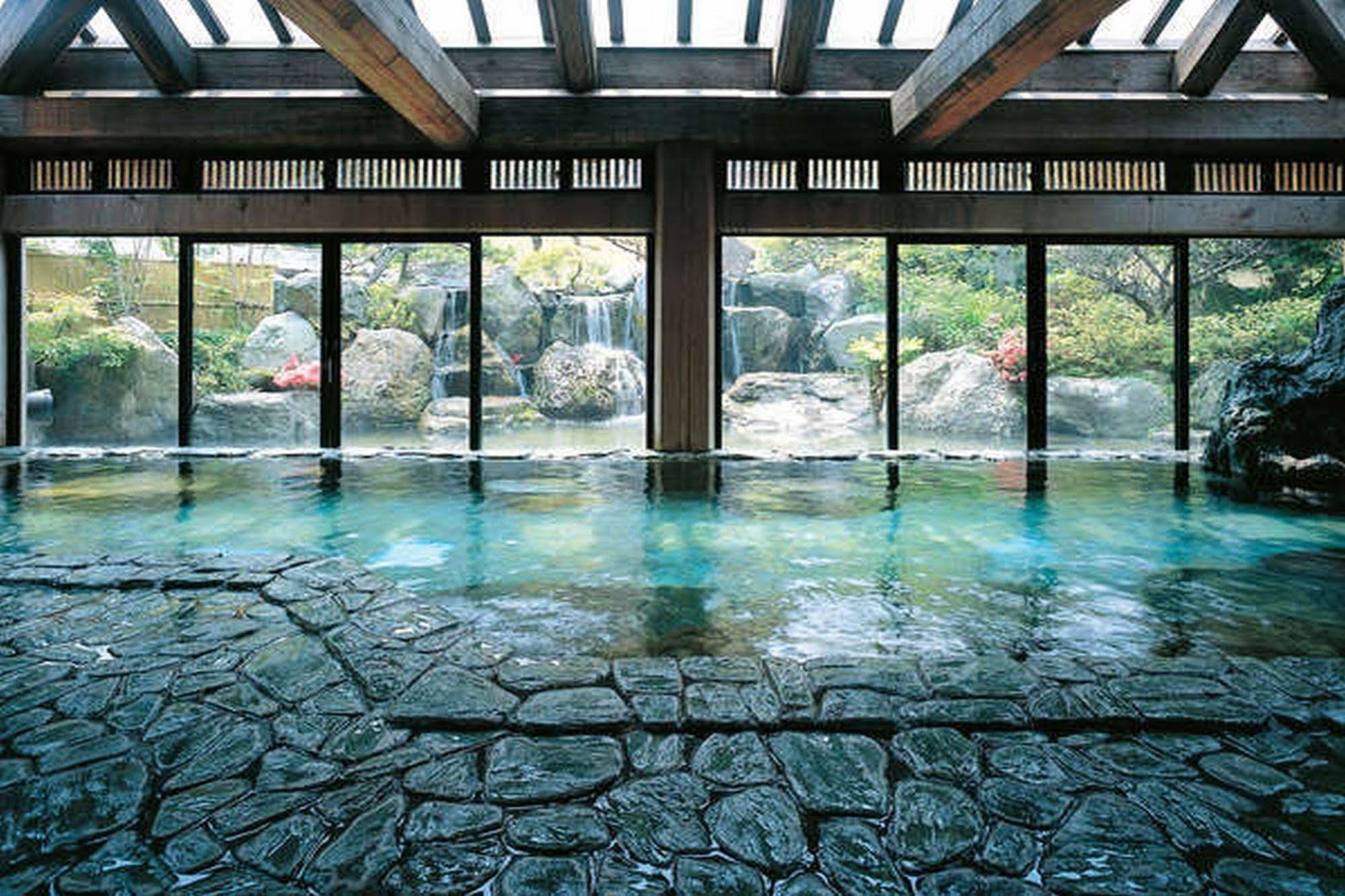 Yuraku Hotel Awara Bagian luar foto
