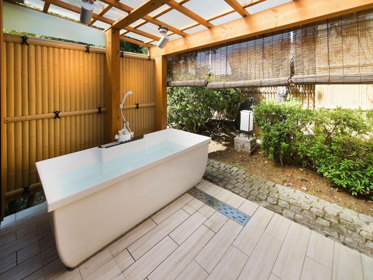 Yuraku Hotel Awara Bagian luar foto
